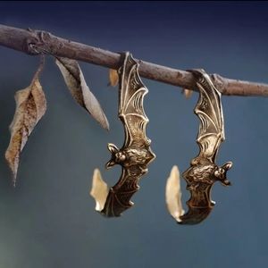 GOLD TONE Bat Earrings
